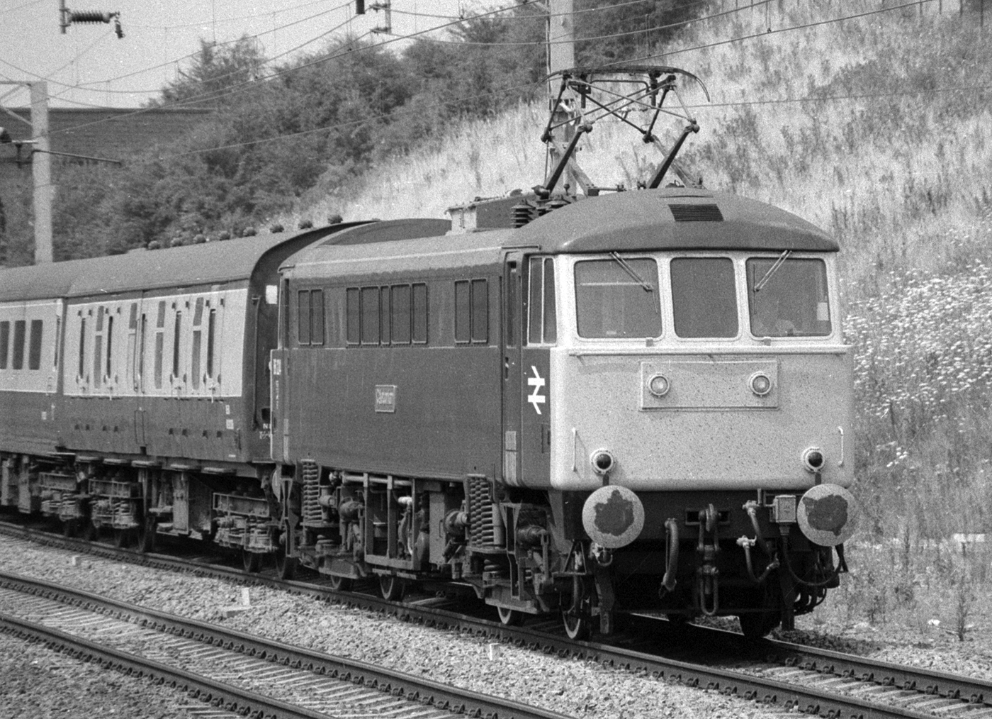 An "up" express (London-bound) is led by 86 224 "Caledonian".