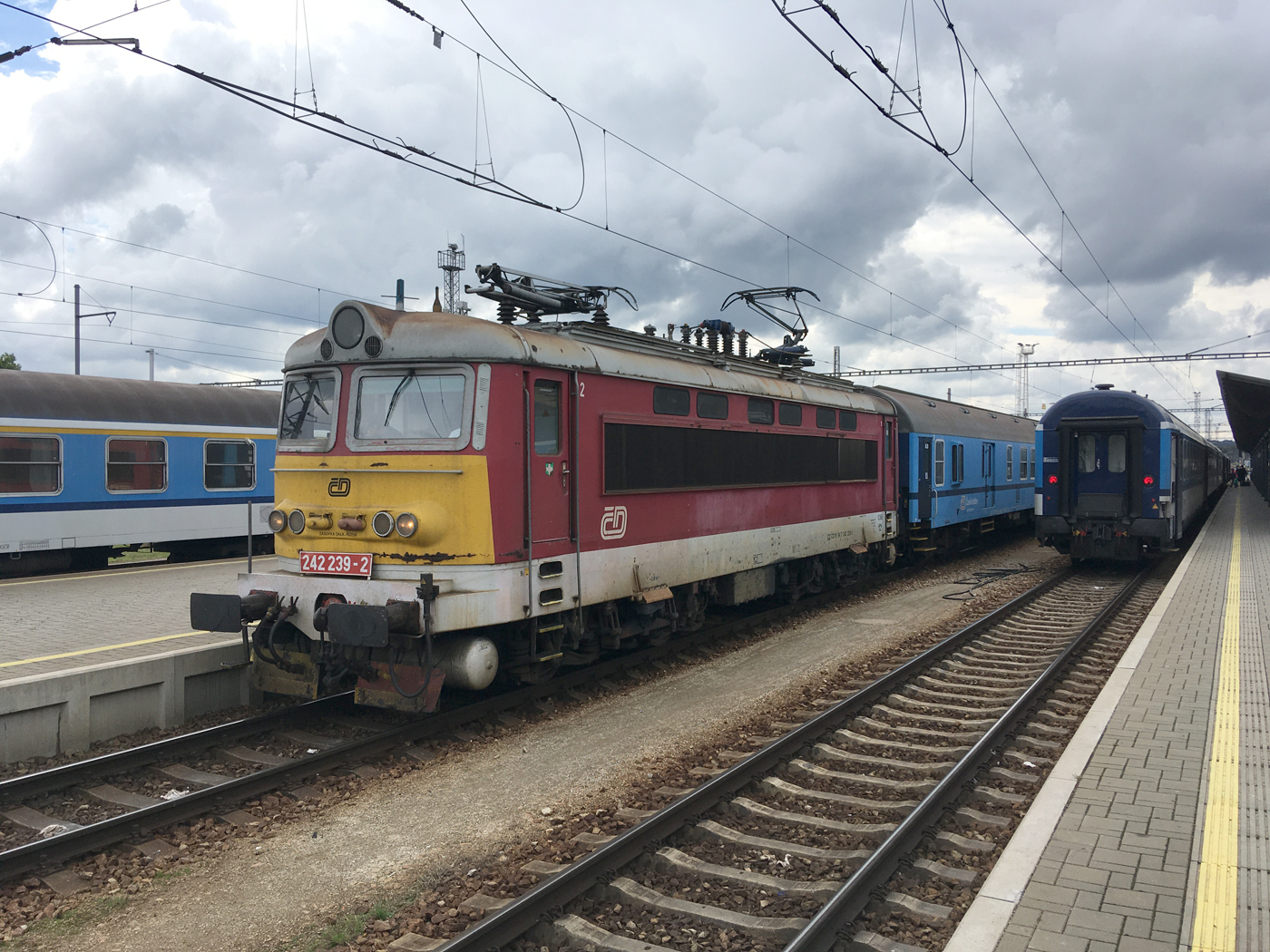 CD class 242 electric locomotive on a regional train at Plzeň